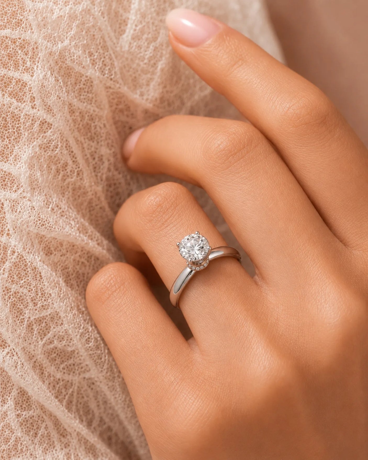 Minimal round moissanite ring with sculptural floral setting and polished white gold band | SARATTI