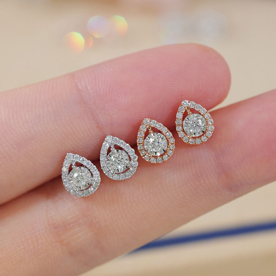 Petite Prong Set Tiny Diamond Stud Earrings in Model's Finger  | Saratti | Custom High and Fine Jewelry 