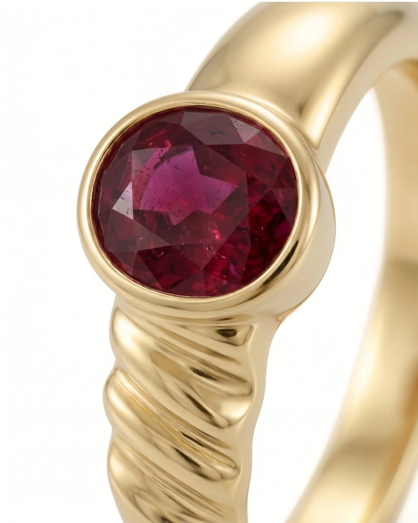 Minimalist ruby engagement ring in 18K yellow gold with oval solitaire gemstone | SARATTI