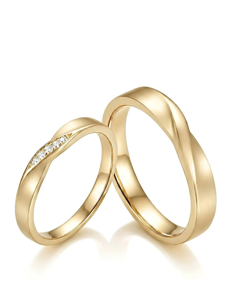 Mobius Promise his and hers wedding bands with endless twist design in polished 18K yellow gold | SARATTI