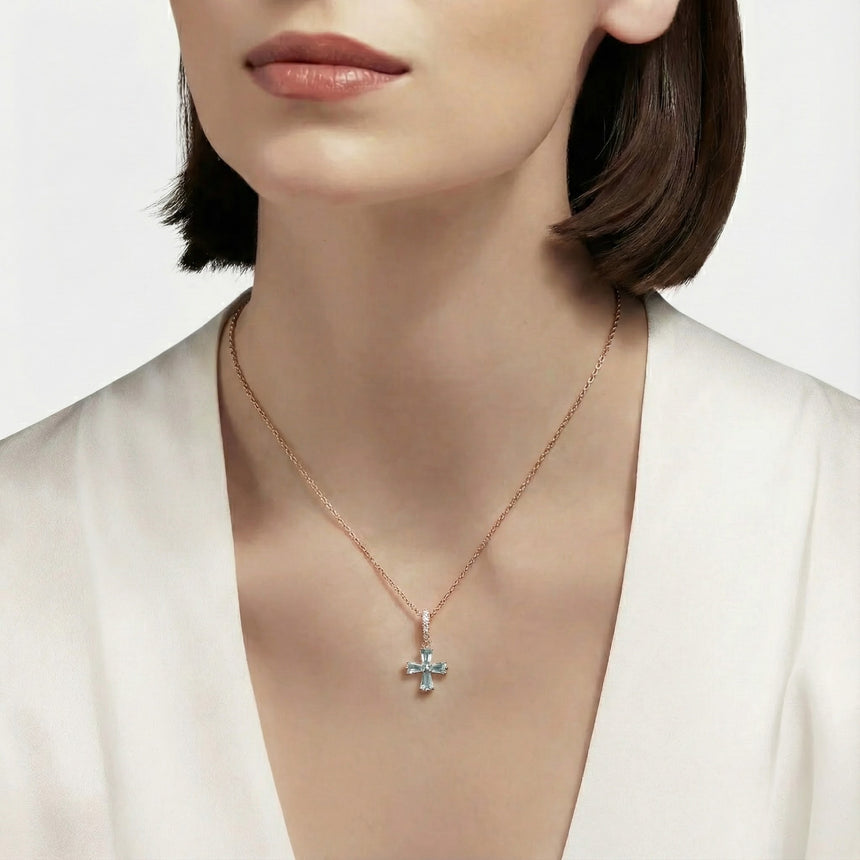 Model wearing the Celestial Cross Aquamarine Necklace in 18K Rose Gold – SARATTI
