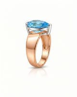 Modern aquamarine ring with flowing artistic band design in 18K Rose Gold | SARATTI