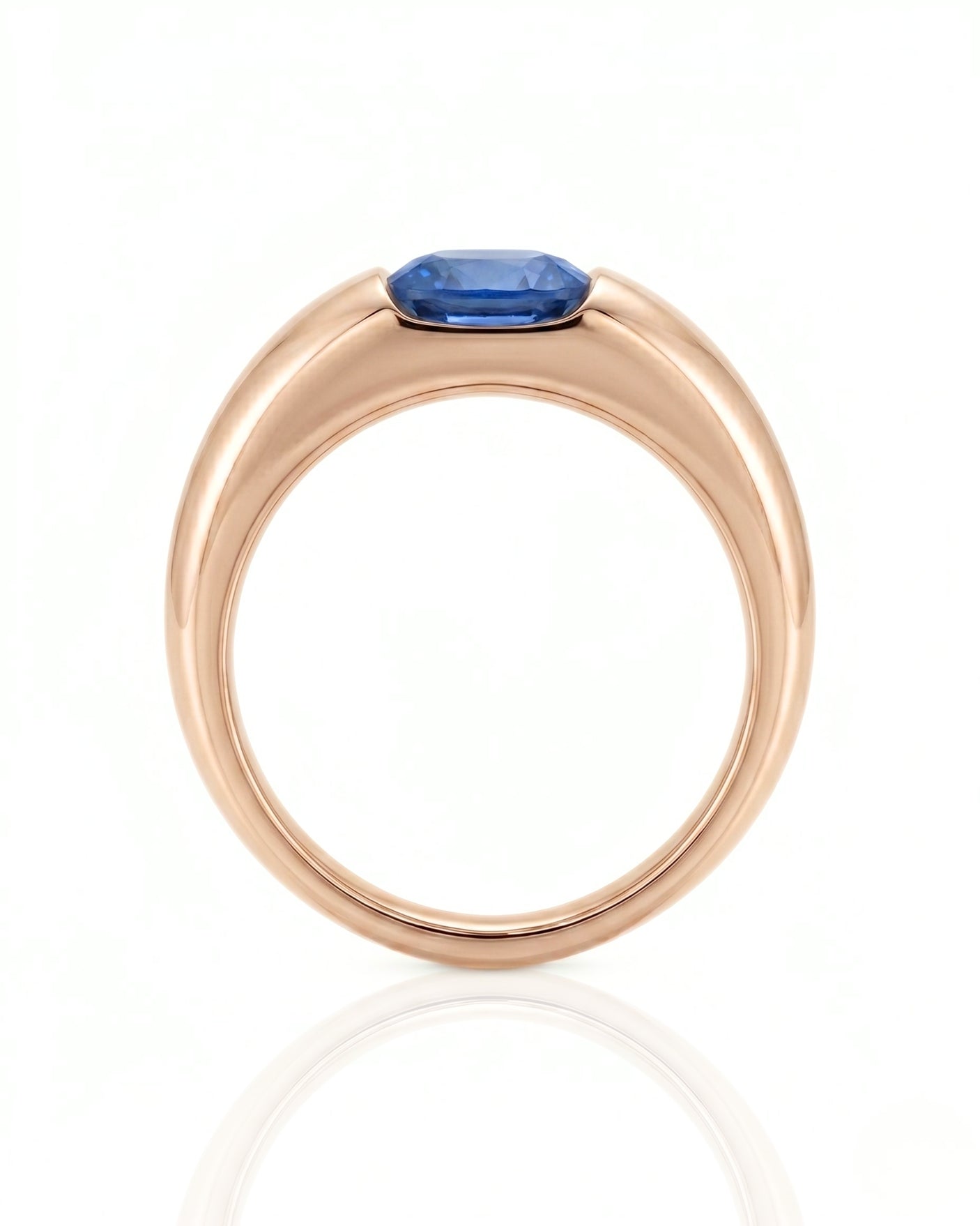 Modern cushion sapphire ring with smooth tension setting and polished 18K rose gold band -- SARATTI