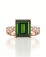 Modern green tourmaline diamond ring with step-cut center stone in 18K rose gold | SARATTI