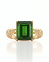 Modern green tourmaline diamond ring with step-cut center stone in 18K yellow gold | SARATTI