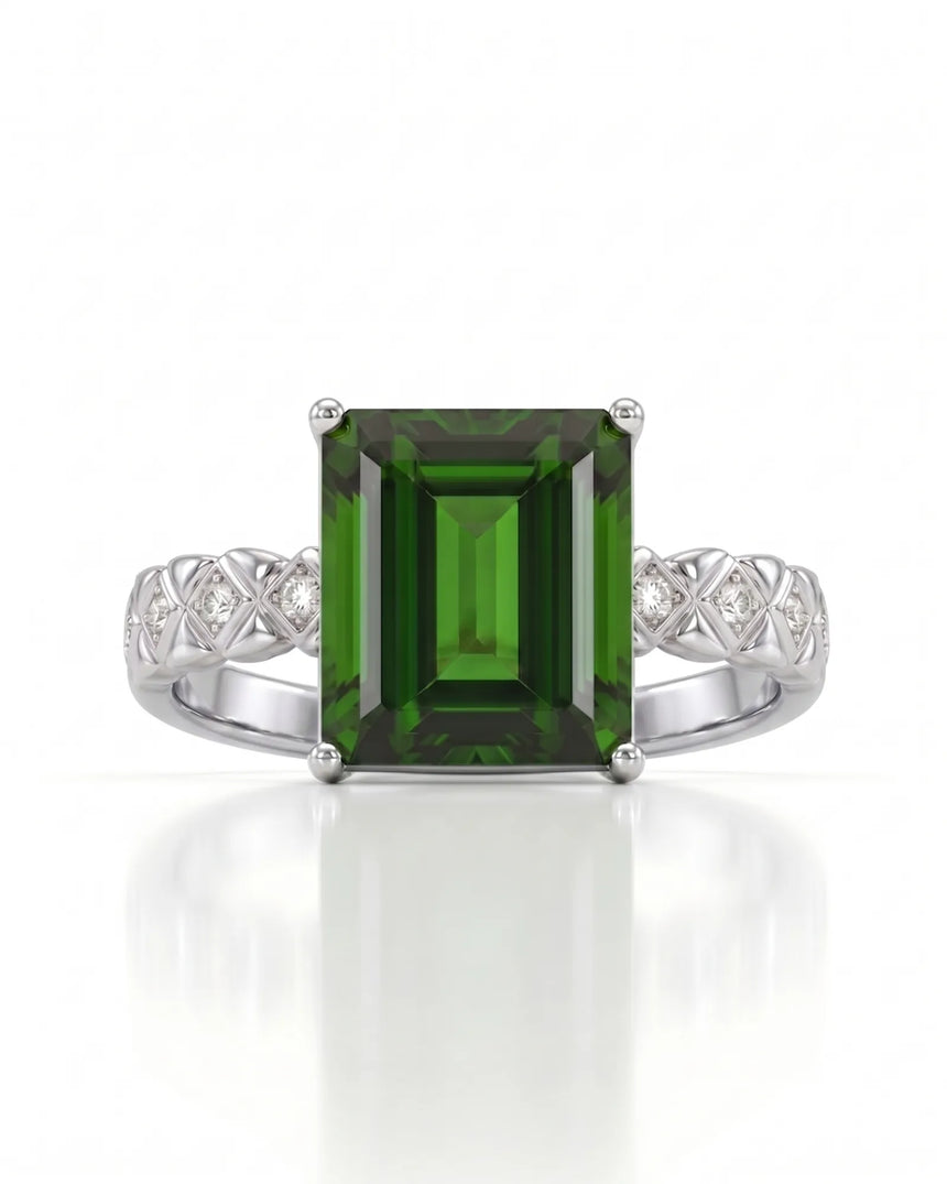 Modern green tourmaline diamond ring with step-cut center stone in polished platinum | SARATTI