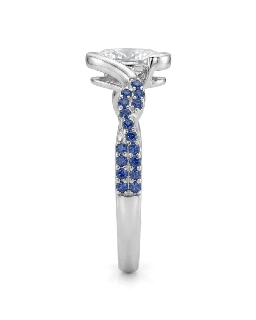 Modern platinum moissanite engagement ring with blue sapphire pavé for a timeless proposal | SARATTI