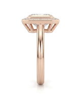 Modern radiant moissanite engagement ring with halo accents in polished 18K rose gold | SARATTI