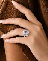 Modern radiant moissanite engagement ring with halo accents in polished 18K white gold - SARATTI