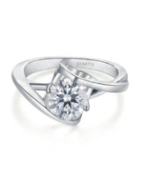 Modern round moissanite engagement ring with symbolic infinity design crafted in enduring platinum | SARATTI