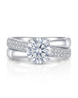 Modern round moissanite proposal ring with wide intertwined shoulders in polished platinum | SARATTI
