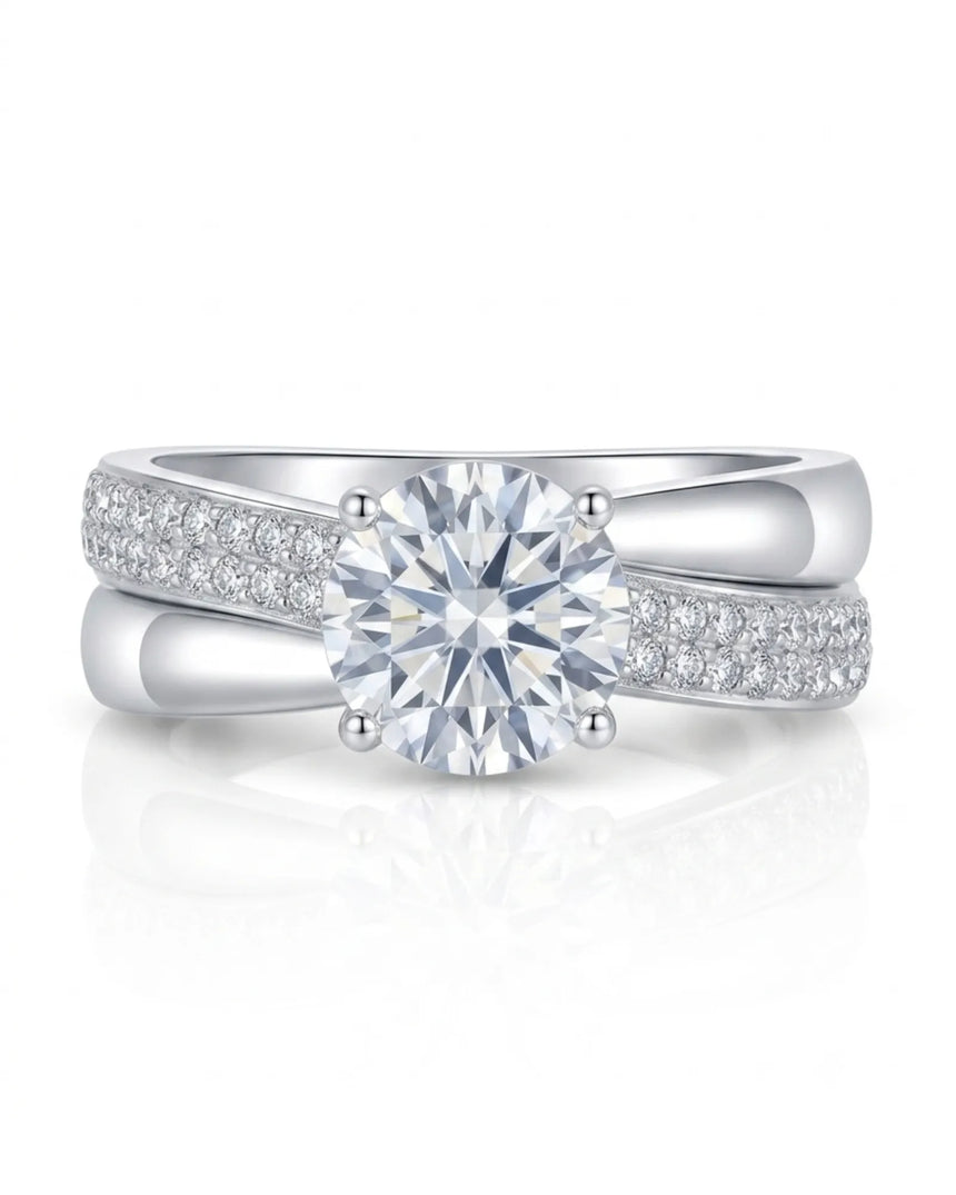 Modern round moissanite proposal ring with wide intertwined shoulders in polished platinum | SARATTI