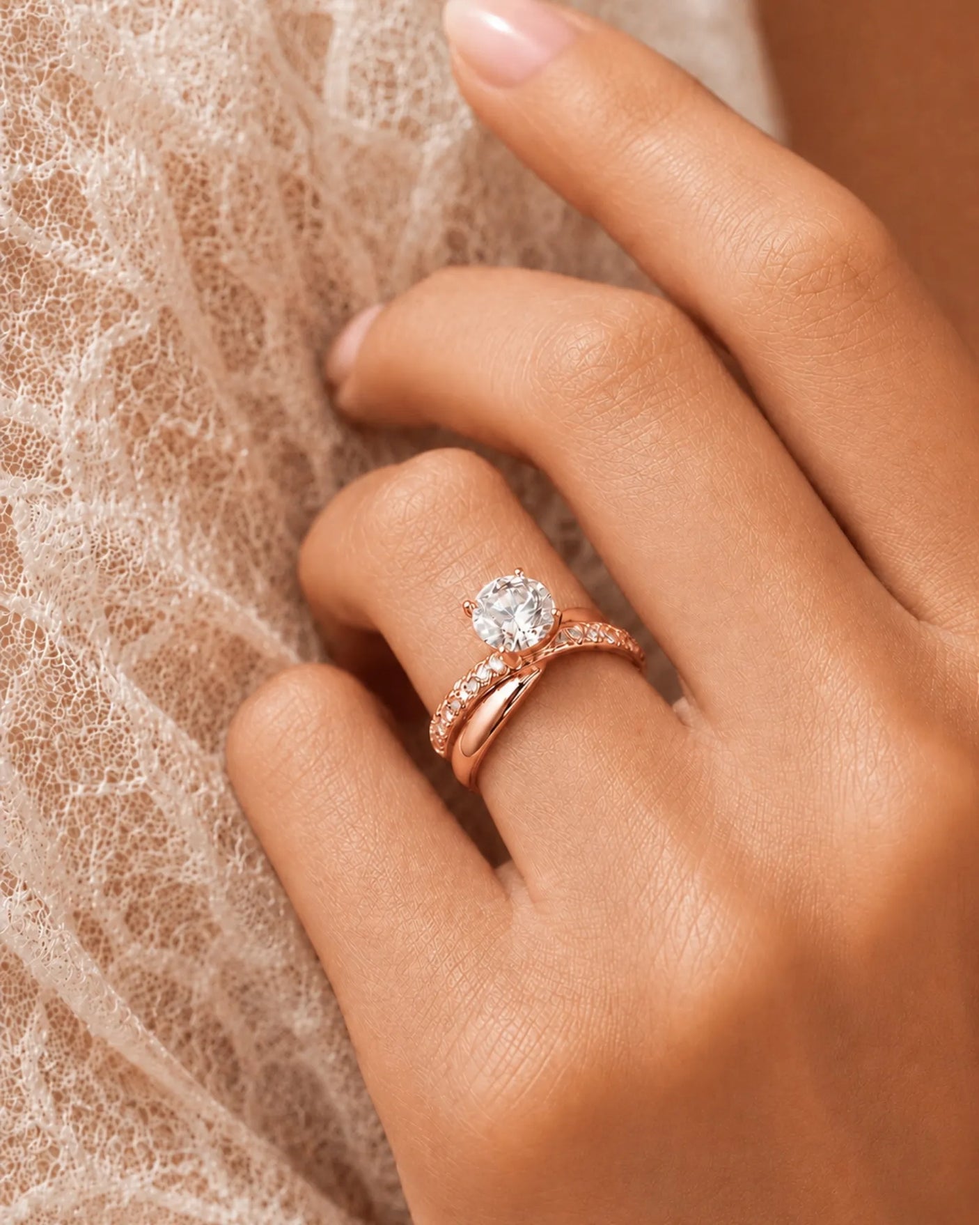 Modern round moissanite proposal ring with wide intertwined shoulders in romantic 18K rose gold | SARATTI