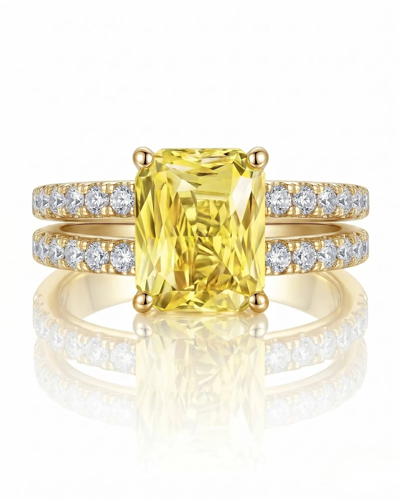 Modern split shank sapphire ring with round diamonds in warm 18K yellow gold | SARATTI