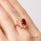 Close up Shot of a Model Wearing the Coronet Rouge Gold Garnet Ring | Saratti