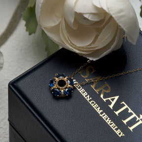 Etoile Zafiro Blue Sapphire Pendant against the Saratti Backdrop | Saratti Fine Jewelry 