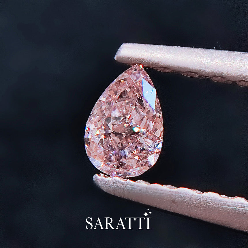 Natural 0.25ct Fancy Light Orangy Pink diamond pear cut GIA certified | SARATTI