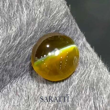 Natural 1.53 carat round Cat’s Eye Chrysoberyl showing chatoyancy | SARATTI