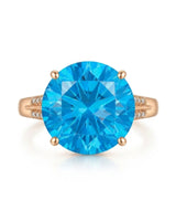 Natural 9.5-carat Swiss Blue topaz ring with round center and diamond accents in 18K rose gold | SARATTI