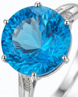 Natural 9.5-carat Swiss Blue topaz ring with round center and diamond accents in platinum - SARATTI