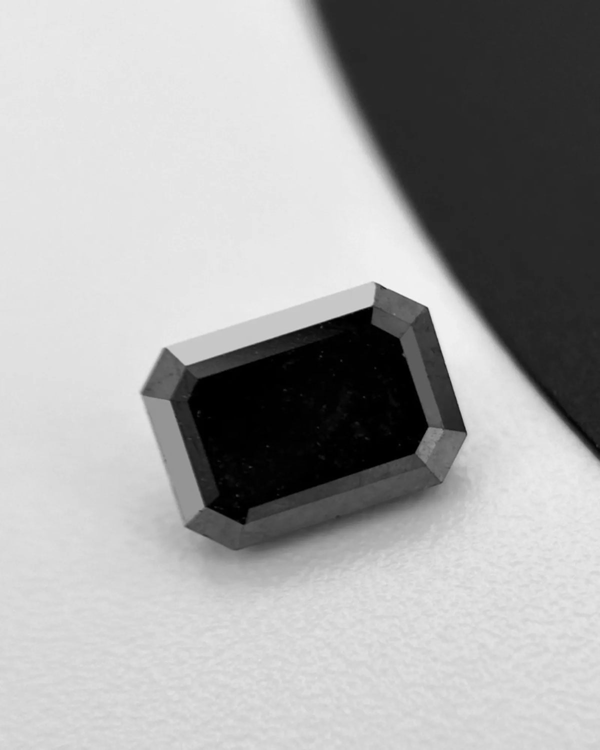 Natural Black octagonal diamond with polished dark surface | SARATTI