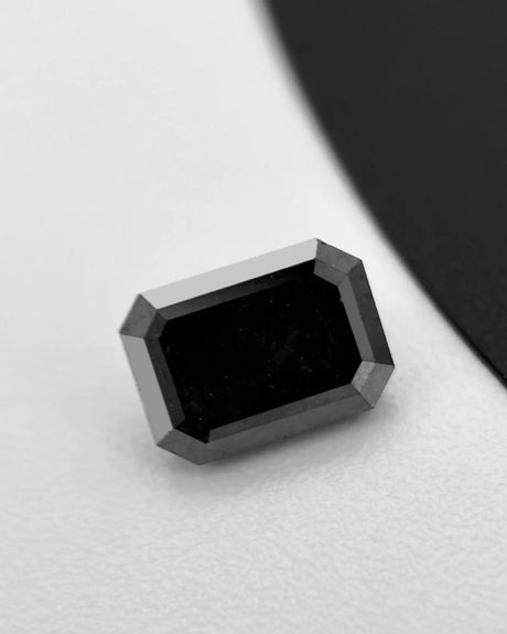 Natural Black octagonal diamond with polished dark surface | SARATTI
