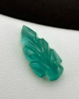 Natural Emerald carved leaf loose gemstones shown from an alternate angle - SARATTI