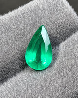 Natural Emerald pear showing bright reflections and active facet movement | SARATTI