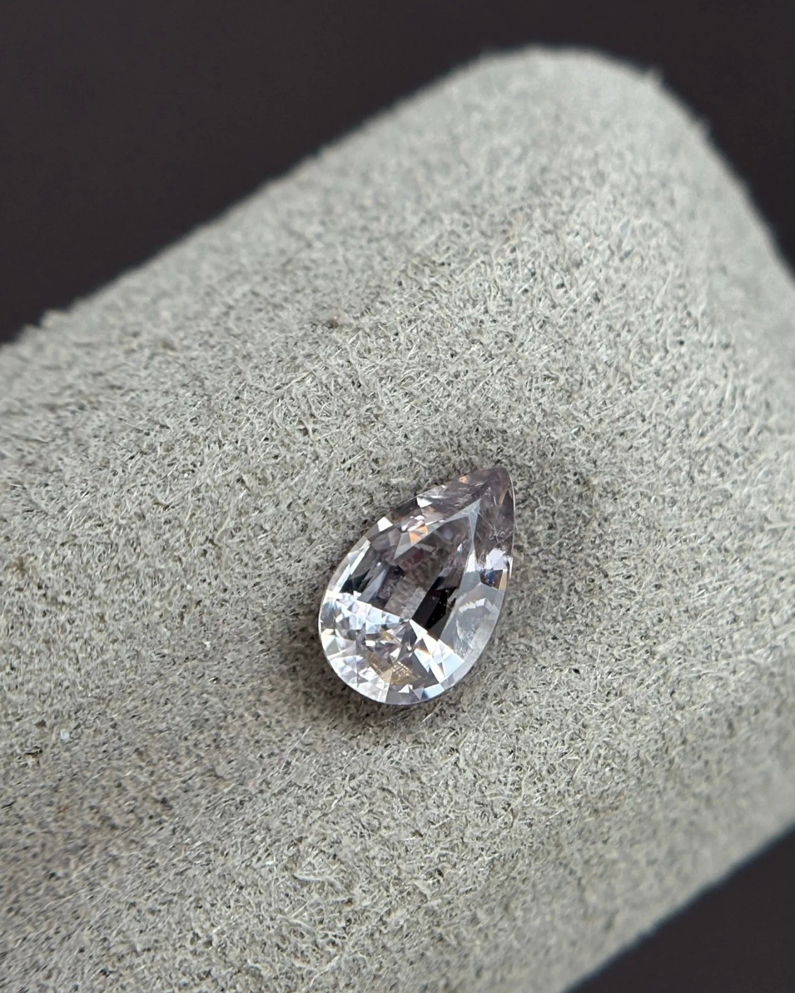 Natural Gray Spinel Pear Cut loose gemstone close-up | SARATTI