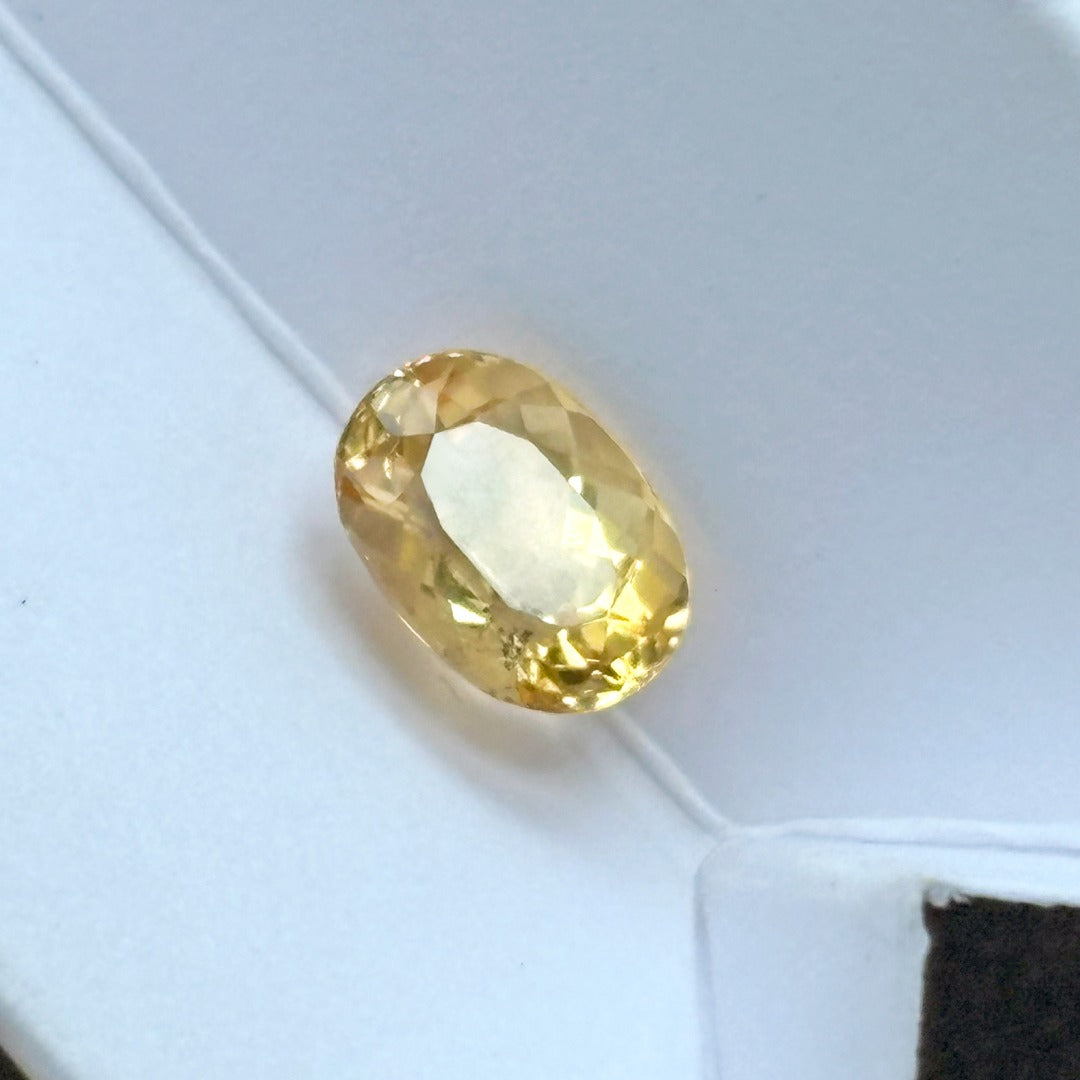Natural Imperial Topaz 1.75 carat oval cut golden tone | SARATTI