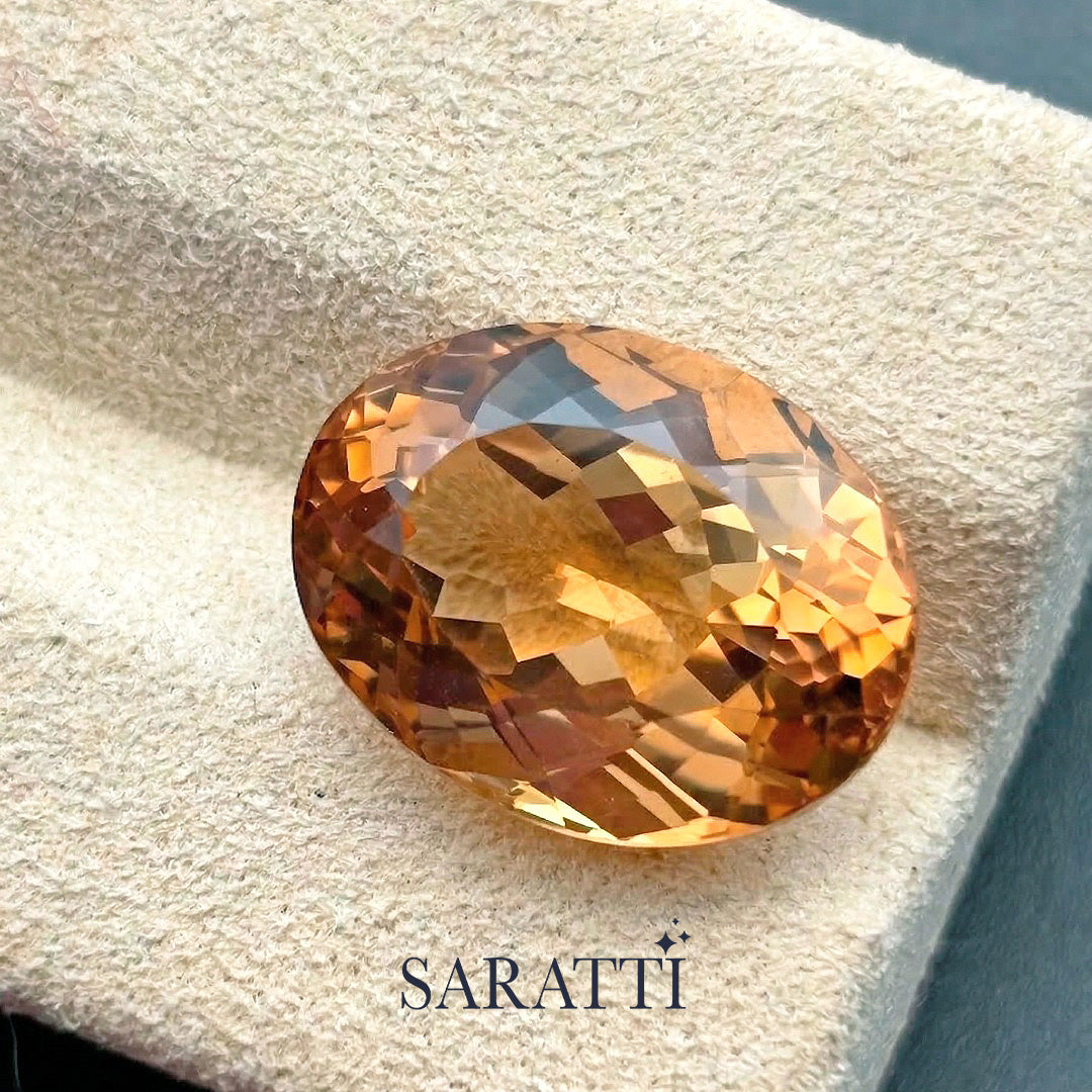 Natural Imperial Topaz 13.65 carat oval champagne color gemstone | SARATTI