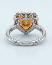 Natural Imperial Topaz heart setting with double halo in platinum | SARATTI
