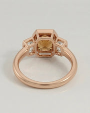 Natural Imperial Topaz oval bezel setting with diamond side stones in 18K rose gold | SARATTI