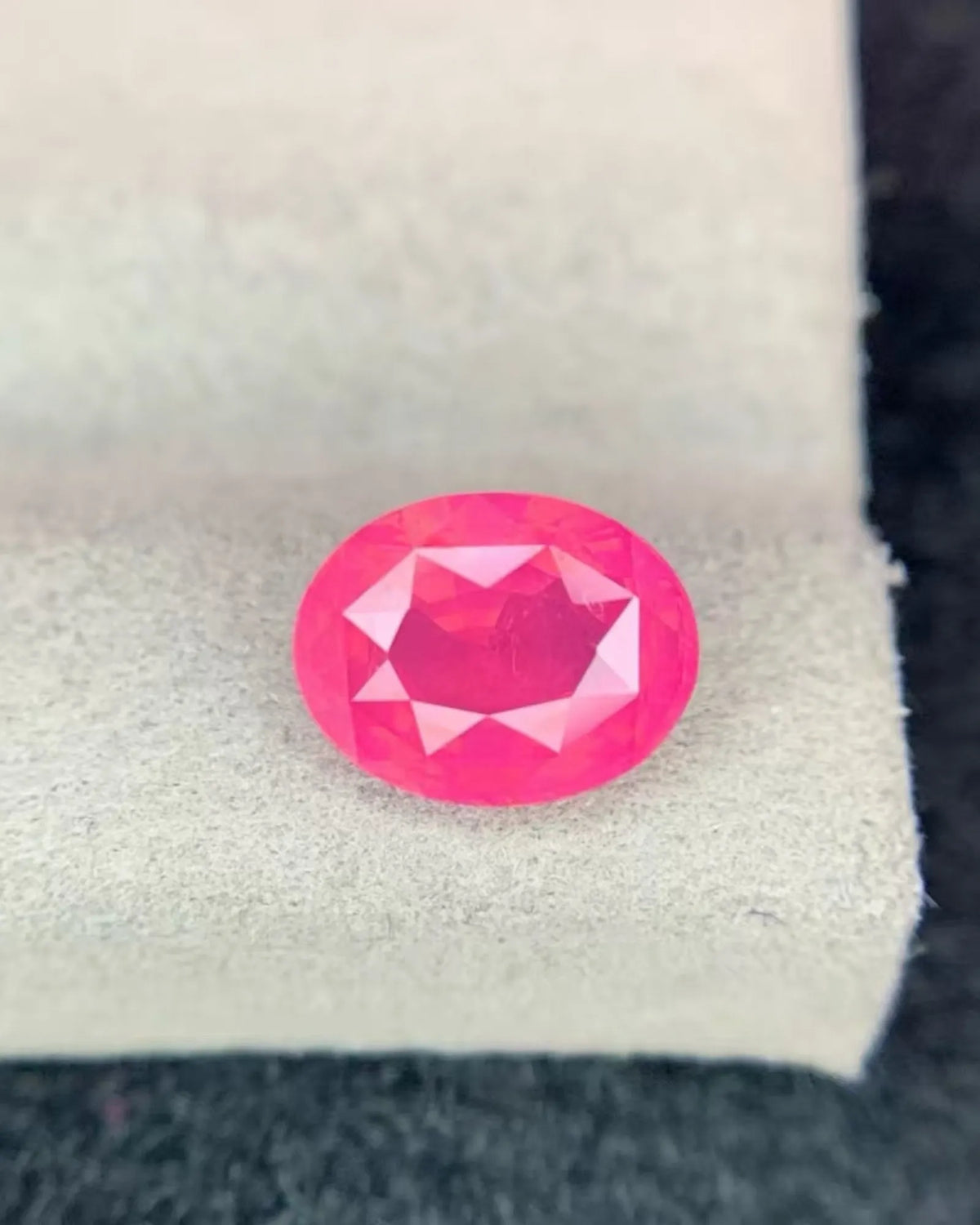 Natural Mahenge Vivid Orangy Pink Spinel loose gemstone close-up | SARATTI