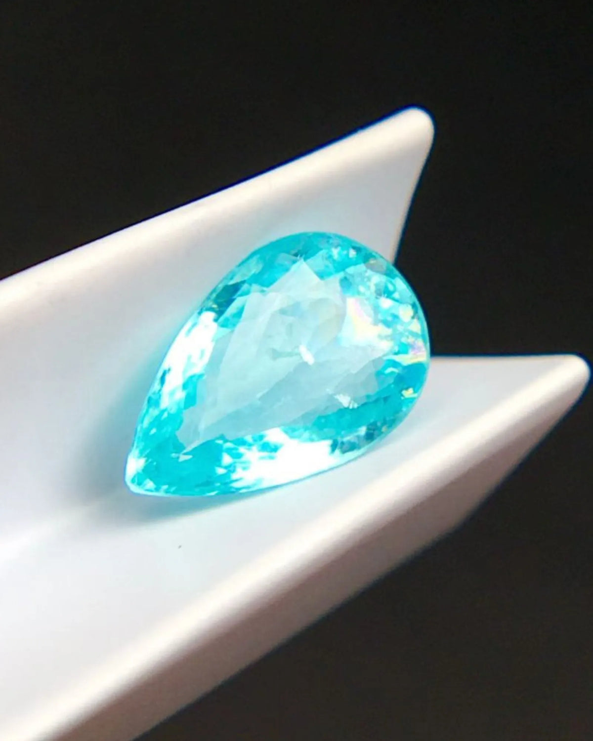 Natural Neon Blue Tourmaline pear loose gemstone with faceted cut | SARATTI