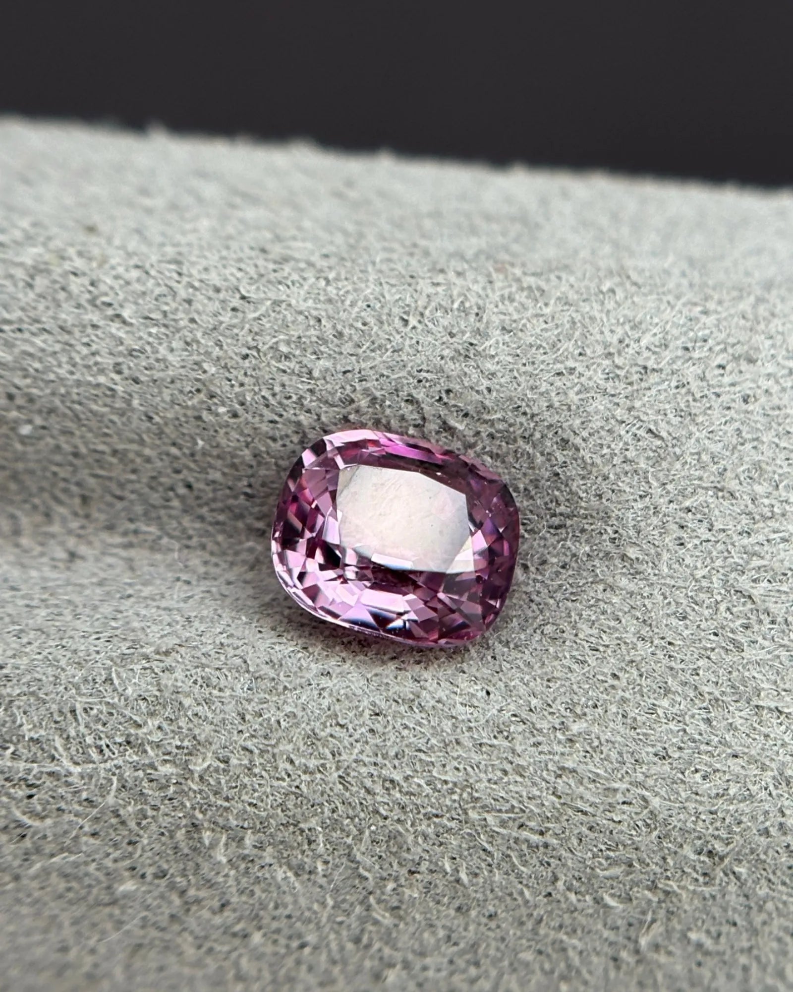 Natural Pink-Purple Spinel Cushion Cut loose gemstone close-up | SARATTI
