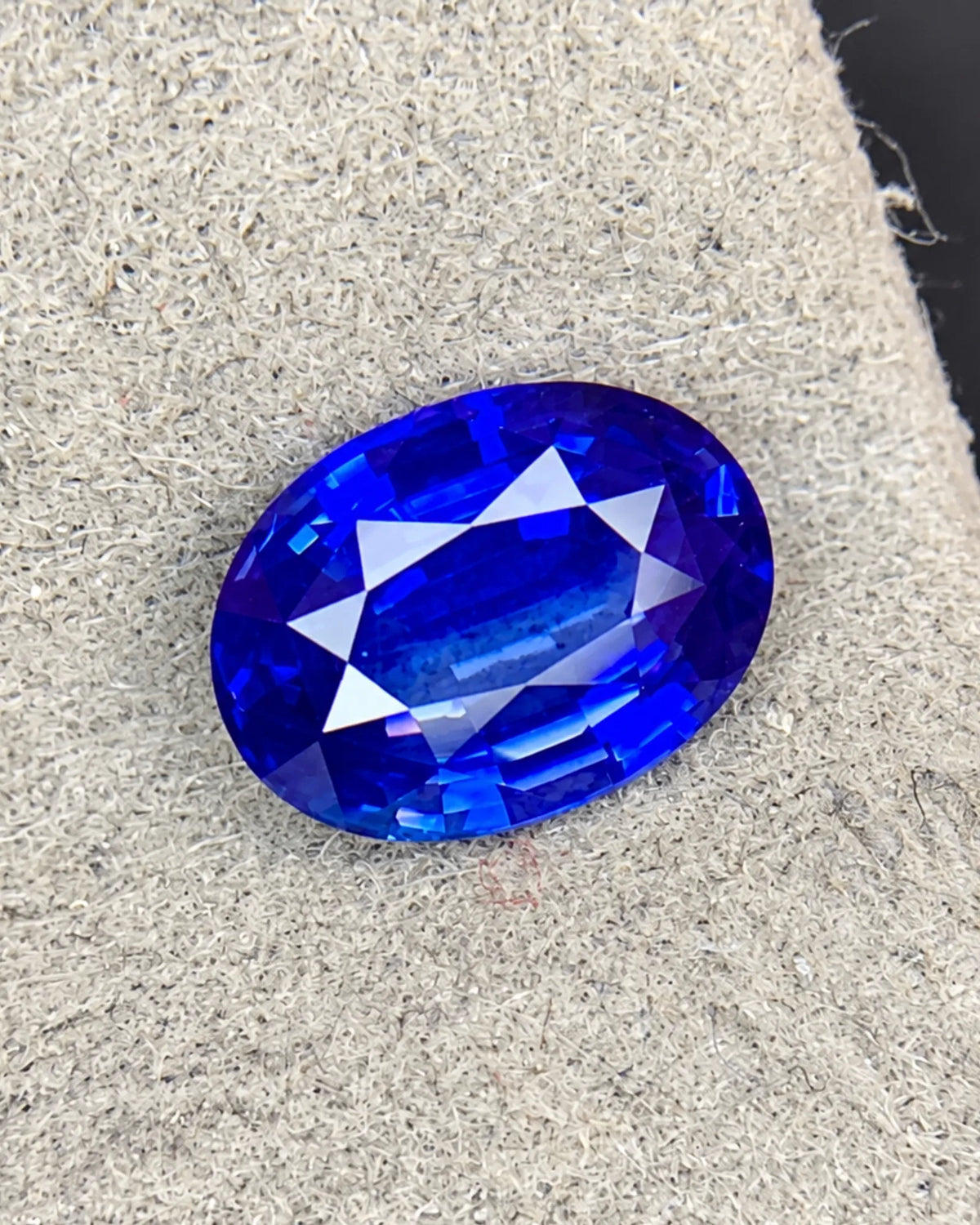 Natural Royal Blue Sapphire 2.05 carats oval modified brilliant cut gemstone close-up | SARATTI