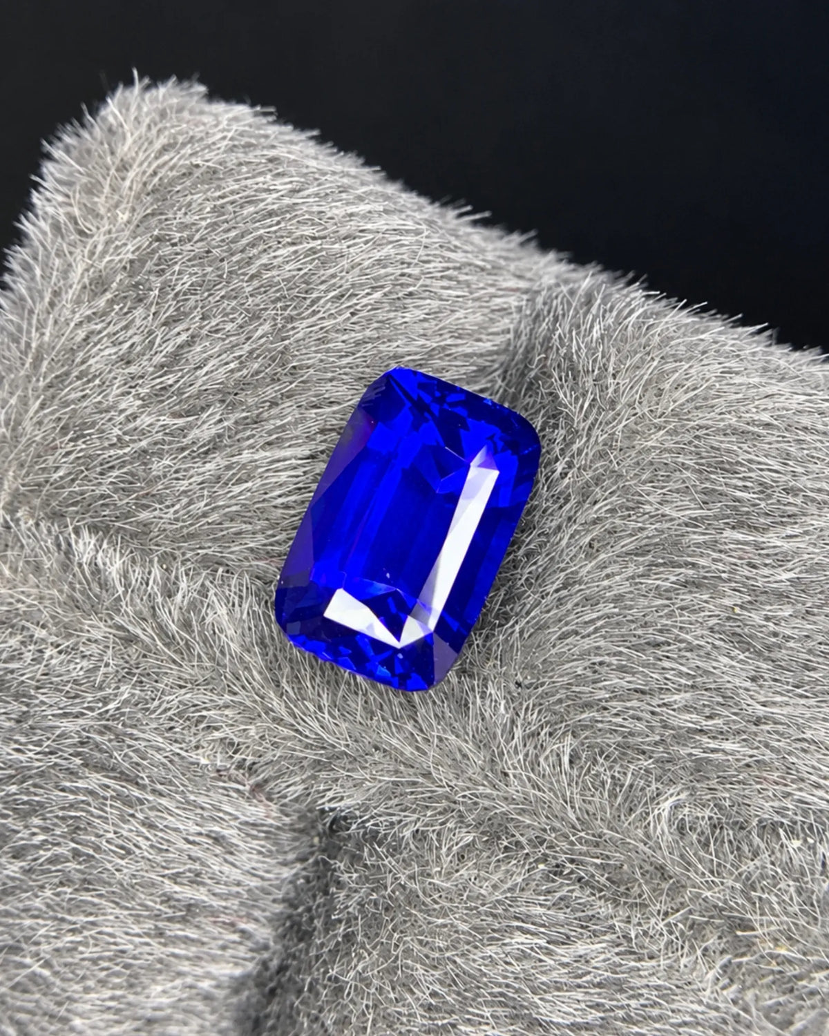 Natural Royal Blue Sapphire 2.09 carats cushion modified brilliant cut gemstone close-up | SARATTI