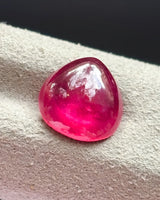 Natural Ruby loose gemstone pear cabochon close-up | SARATTI