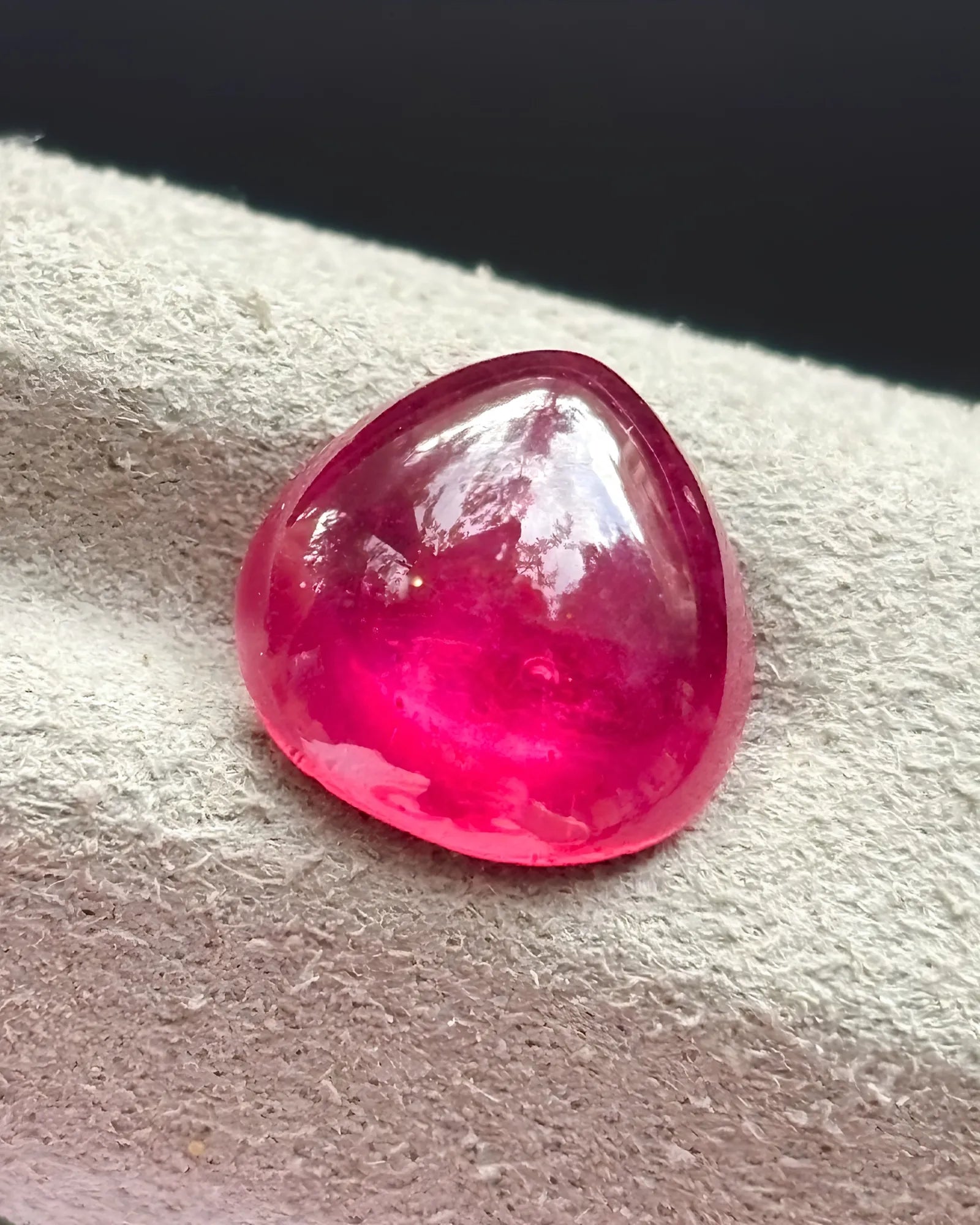 Natural Ruby loose gemstone pear cabochon close-up | SARATTI