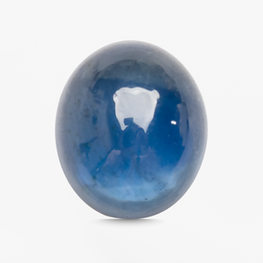 Natural blue sapphire cabochon showing deep midnight tones | SARATTI