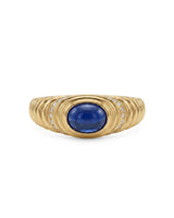 Natural blue sapphire ring with smooth oval cabochon and diamonds in 18K yellow gold | SARATTI