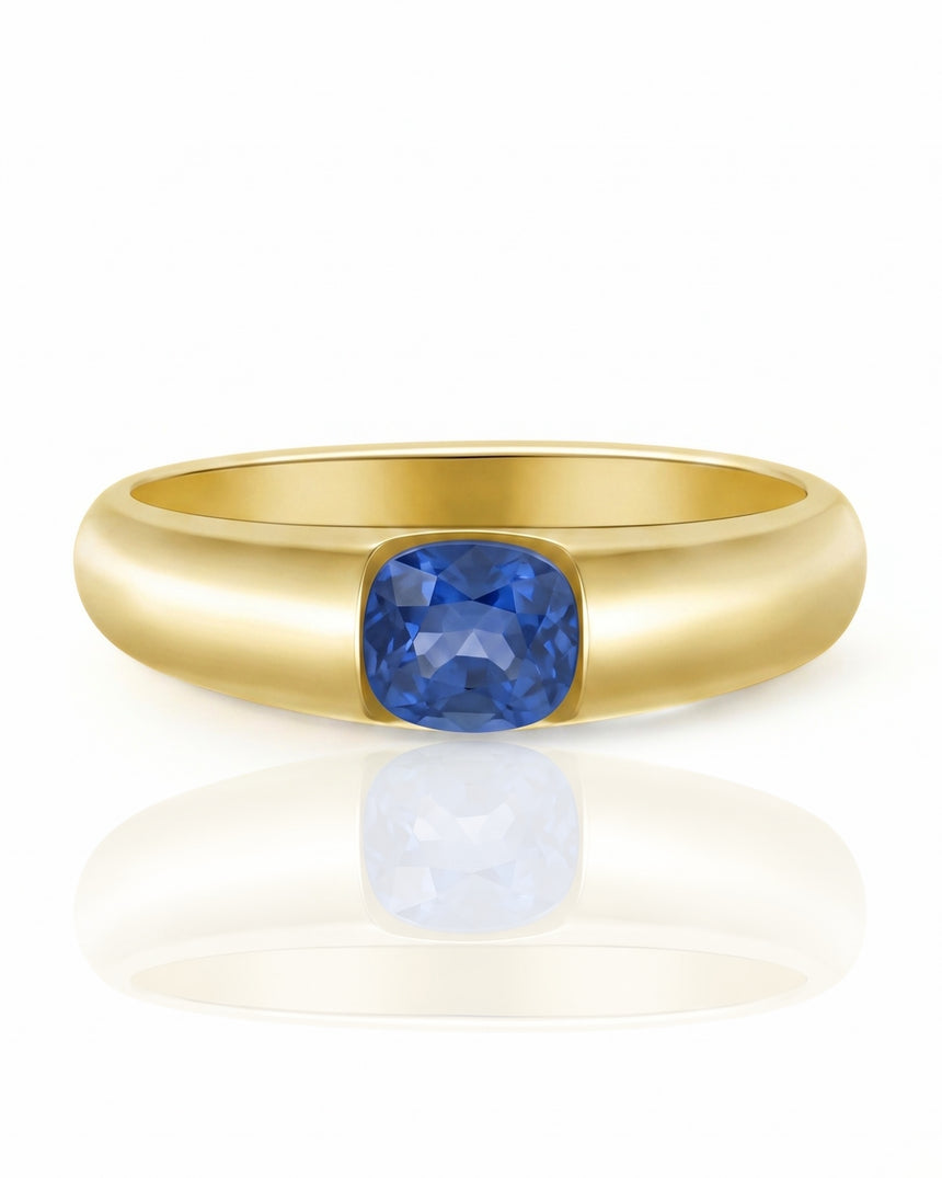 Natural blue sapphire solitaire ring with architectural cushion cut design in 18K yellow gold | SARATTI