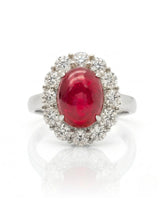 Natural cabochon ruby ring with brilliant round diamonds in durable platinum | SARATTI