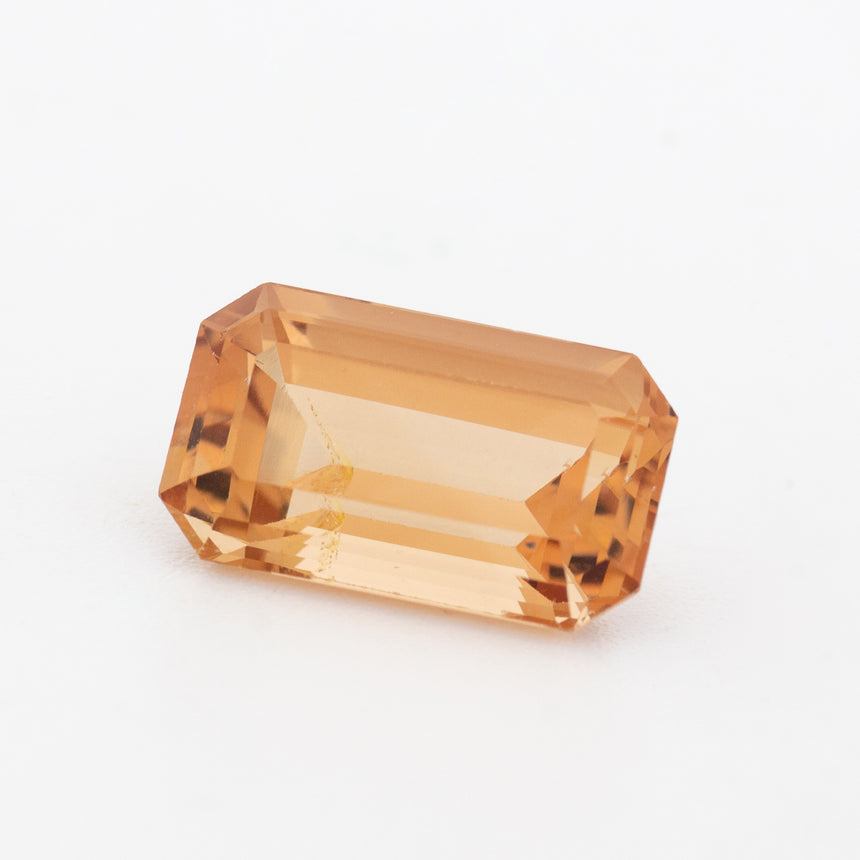 Natural champagne Imperial Topaz 7.7 carat emerald cut | SARATTI