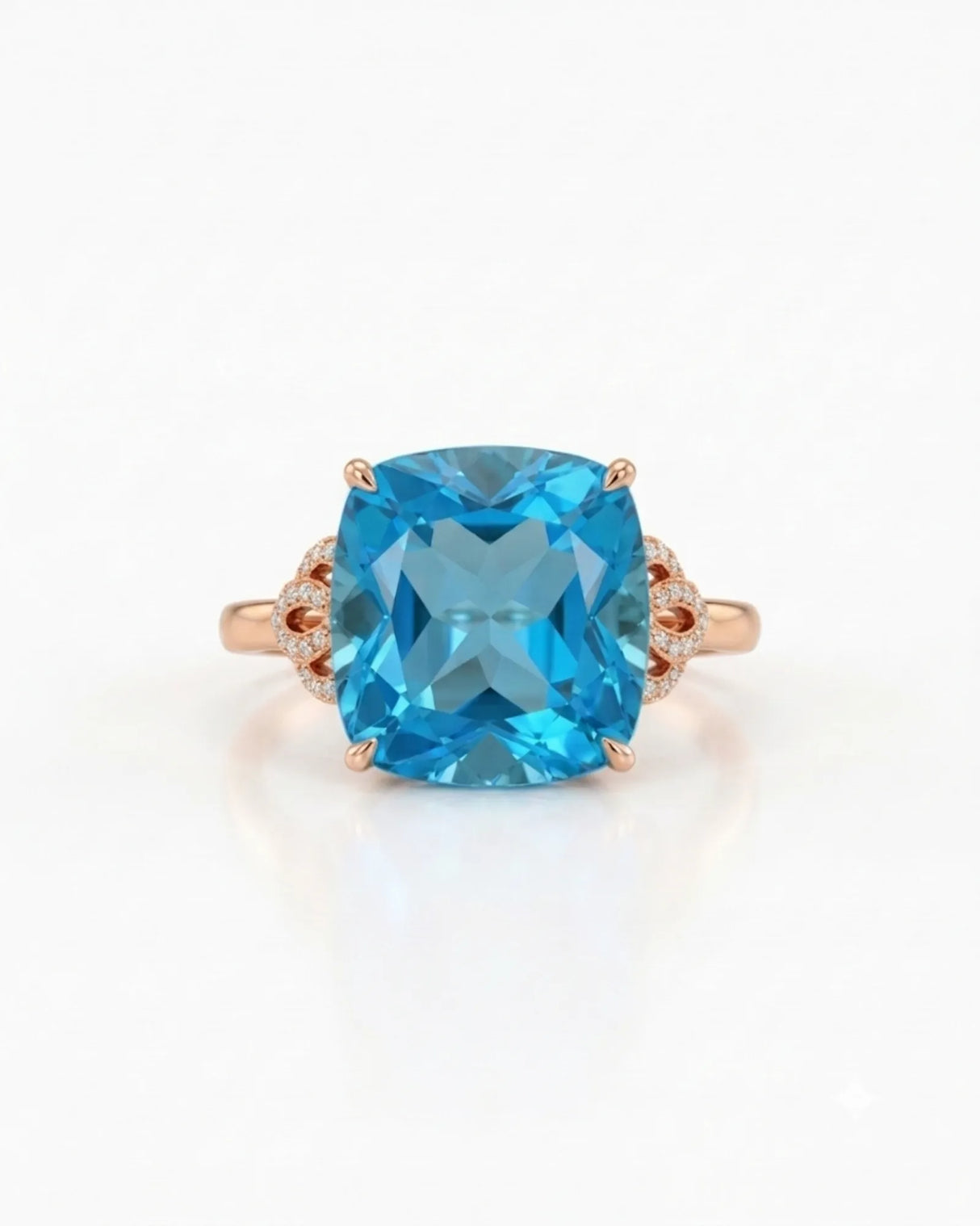 Natural cushion Swiss Blue topaz ring framed by sculpted diamond details in 18K rose gold | SARATTI