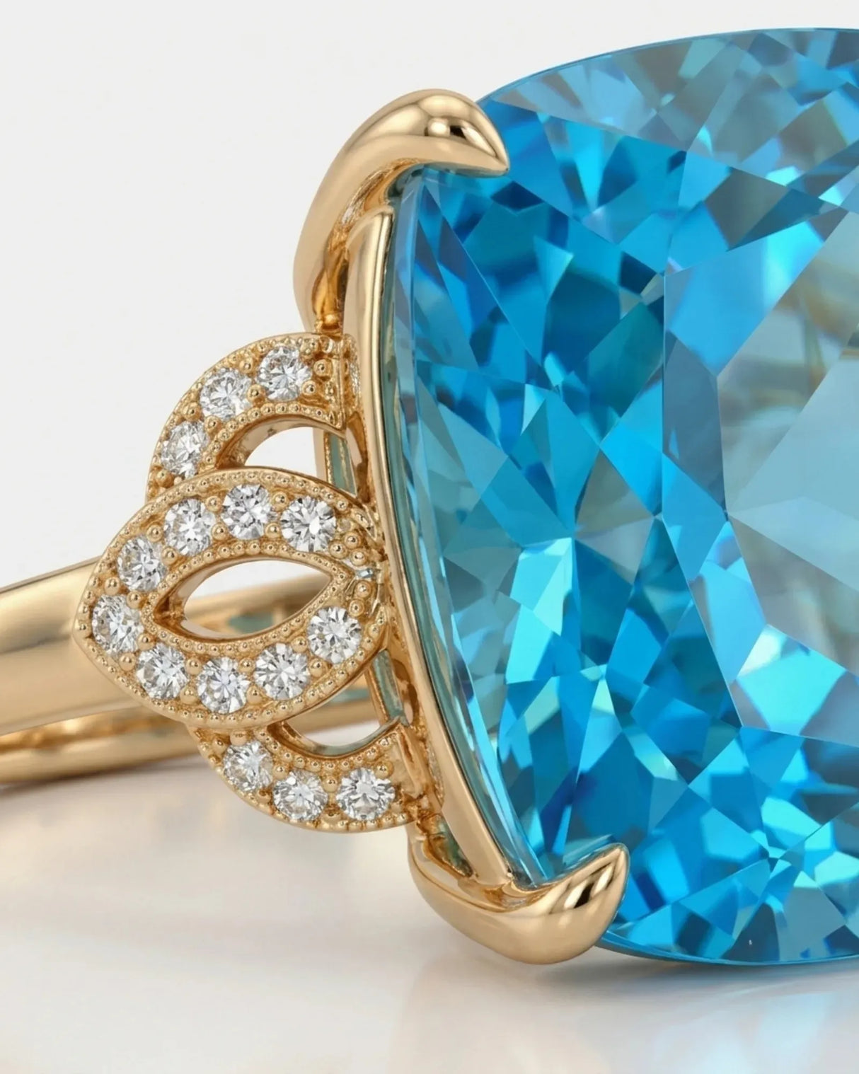 Natural cushion Swiss Blue topaz ring framed by sculpted diamond details in 18K yellow gold | SARATTI
