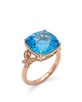 Natural cushion Swiss Blue topaz ring with diamond butterfly shoulders in 18K rose gold | SARATTI