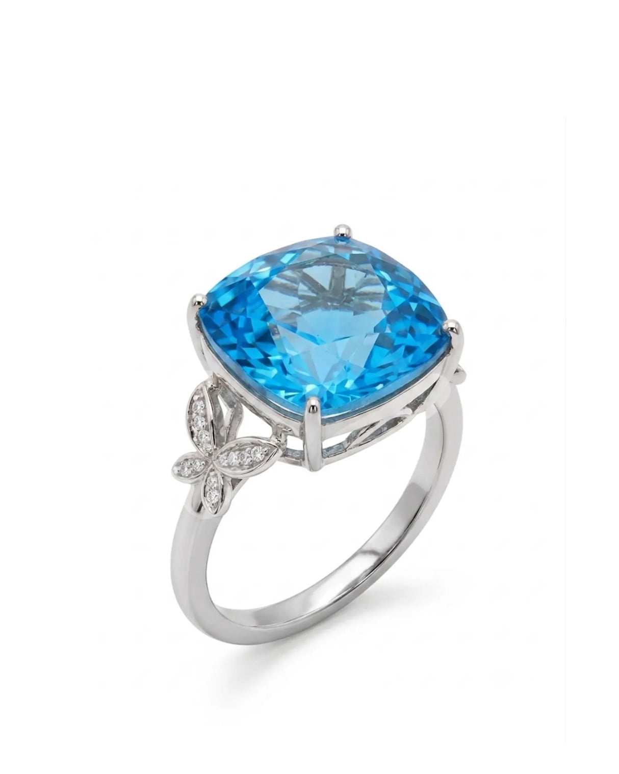 Natural cushion Swiss Blue topaz ring with diamond butterfly shoulders in polished platinum | SARATTI