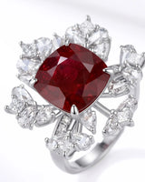 Natural cushion ruby ring with blooming diamond halo and pavé platinum setting | SARATTI